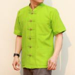 41002 เสื้อผ้าฝ้ายชายสีเขียว เนื้อผ้าชินมัย ตองชัย กระดุมเหรียญ แขนสั้น